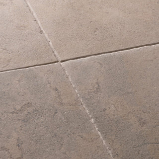 Close-up of a natural stone floor in a beige colour