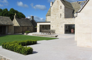 A large outdoor patio and garden