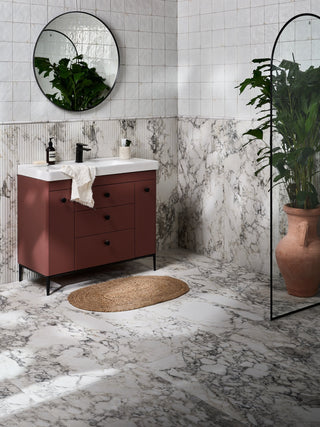 Marble bathroom flooring tiles with a washbasin and shower 