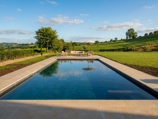 Bespoke stone installation around a swimming pool