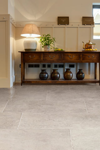 grey porcelain tile flooring in a modern hallway