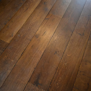Aged timber flooring with dark brown wood
