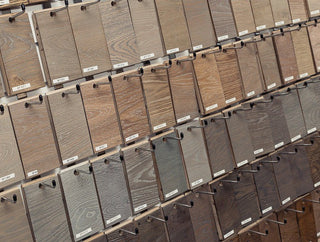 a series wooden flooring samples in various different shades and wood grains